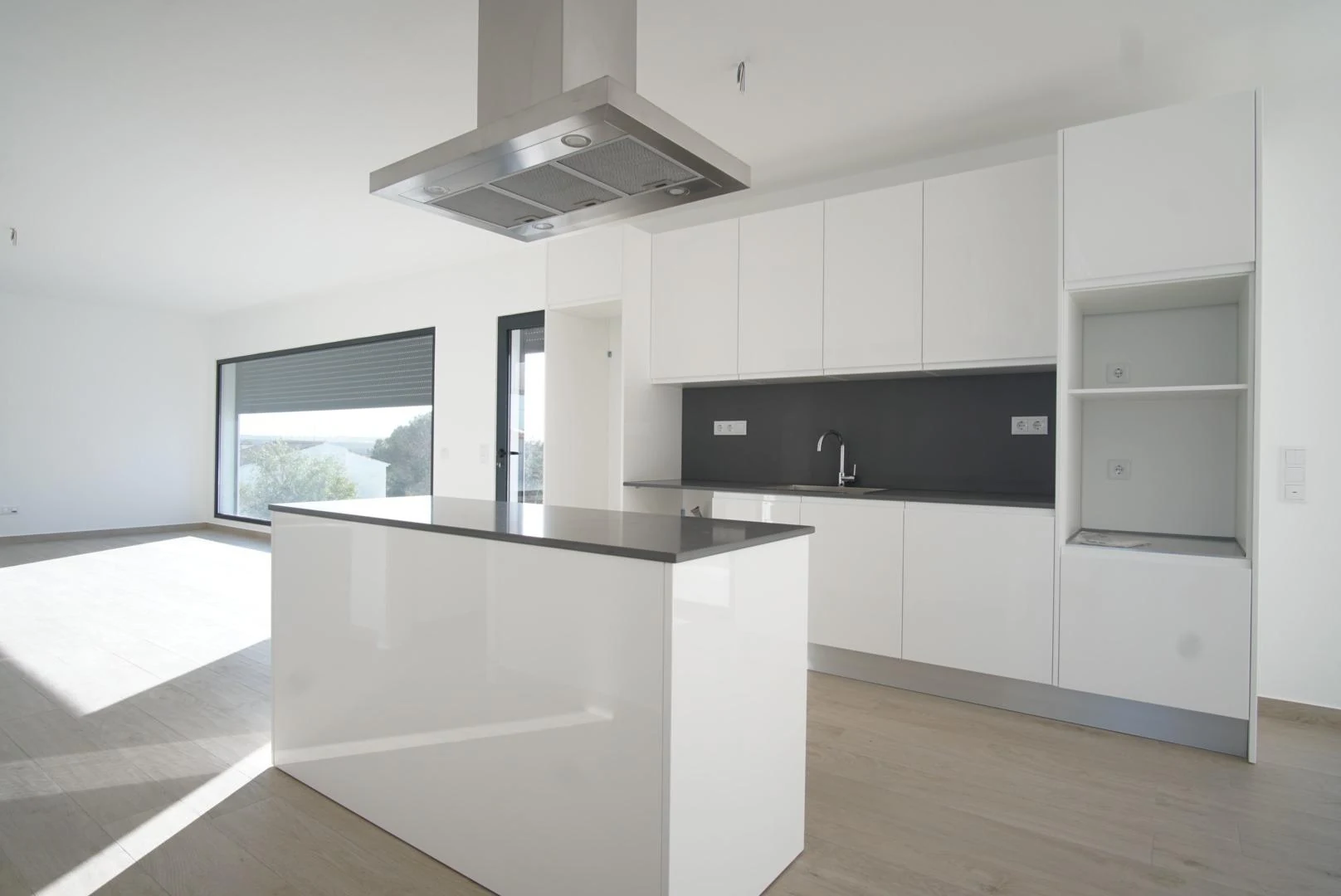 Cozinha com ilha do lote 63